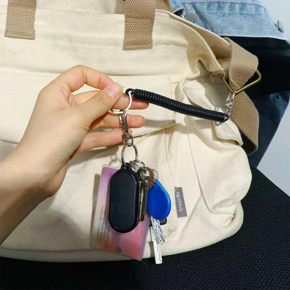 Elastic Coil Spring Wrist Keychain – Stretch Spiral Wristband Key Ring for Running, Gym & Outdoor Use | RUNGEAR