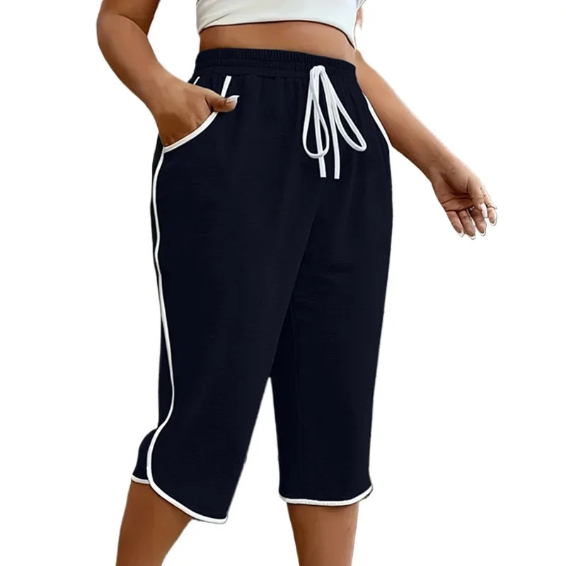 Plus Size Women's Comfortable Stretchy Solid Colour Three Quarter Casual Pants With Pockets